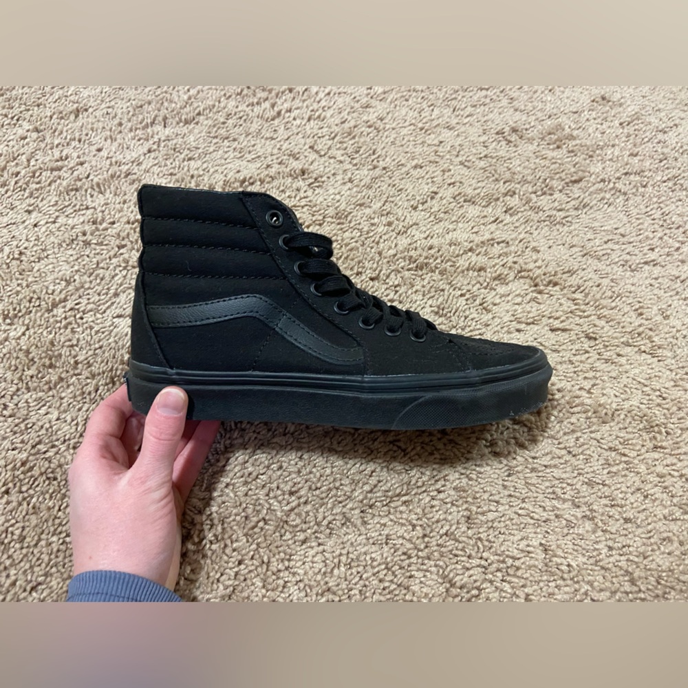 Black hi-top Vans